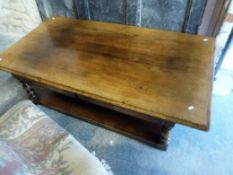 A large oak coffee table with drawers to one side (L149, W79,