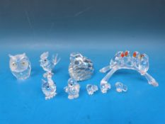Nine Swarovski crystal birds including multi coloured lovebirds, partridge, owl, duck, chickens etc.