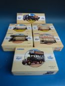 Six Corgi diecast model vehicles to include four trams,