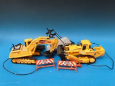 A collection of large scale model vehicles to include a remote control crane