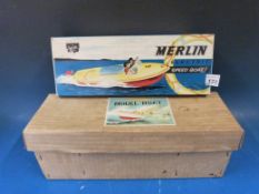 A Sutcliffe 'Merlin' electric boat in box together with a wooden hulled electric boat in box