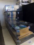 Seven Onyx diecast model Formula 1 cars all in clear plastic display cases
