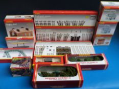 A collection of Horby 00 gauge carriages, wagons,