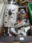 A collection of various Star Wars figures,