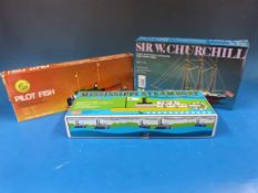 A Mississippi style steam boat kit with steam propelled engine (pop-pop) in box,