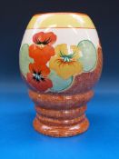 A Clarice Cliff Bizarre vase in the 
