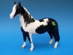 A Beswick piebald pinto pony