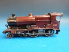 A Hornby 0 gauge 0-4-0 LMS No 2 clockwork Special locomotive 1185 and tender