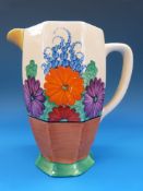 A Clarice Cliff octagonal lemonade jug decorated in 