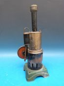 A vertical steam engine by Bing with oscillating cylinder in fixed case and solid flywheel.