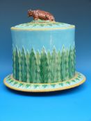 A Victorian George Jones majolica cheese dome on stand, with brown cow finial (height 27cm,