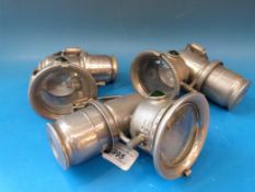 Three 'Lucas Calcia Cadet' carbide bicycle lamps