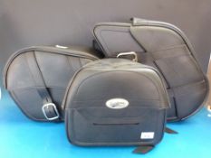 A set of three Travelcade Saddlemen leather motorcycle panniers,