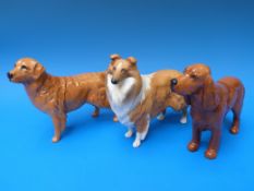 Three Beswick dogs - collie in matt,
