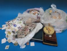 A box of loose all world stamps