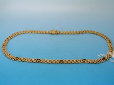 An 18ct gold necklace of elongated flat links, the centre section set with emeralds,