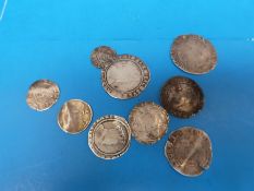 Eight hammered coins of James I comprising two one shilling coins,