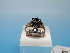 Two 9ct gold rings set with blue stones
