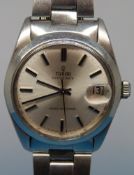 A Tudor Oyster Date gentleman's wristwatch with button numerals on brushed stainless steel face