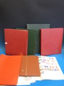 Seven albums of mixed world stamps