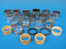 Seventeen various hallmarked silver napkin rings, weight 243g,