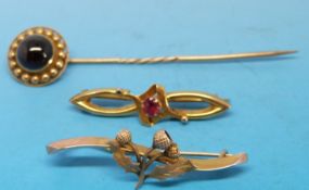 A 9ct gold brooch set with a ruby,