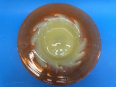 A large Monart glass charger, shape DF and size II, with bright orange rim,