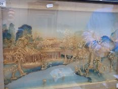 A Chinese cork picture of buildings and trees by a river (32 x 52cm)