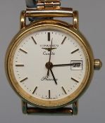 A Longines Presence quartz ladies' wristwatch with date aperture on white face with gold plated