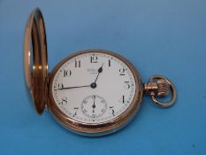 A gentleman's 9ct gold full hunter pocket watch by Waltham USA, hallmarked for Birmingham 1925,