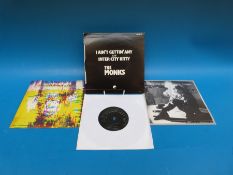 Three boxes of records containing a large collection of approximately 900 7