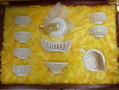A Chinese boxed presentation tea set formed in glass lace work