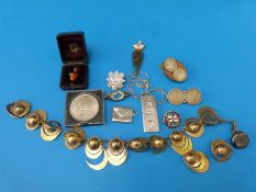 A collection of silver to include an ingot, coins, stamp holder,