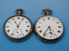 A Birmingham silver 1922 top winding gentleman's pocket watch together with a 1924 example