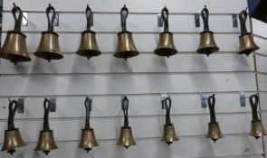 A set of 14 late 19th century/ early 20th century handbells high F sharp to low A with leather