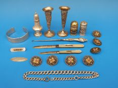 A pair of Burmese white metal vases, hallmarked silver pepper,