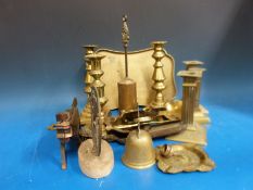 A quantity of brassware to include candlesticks,