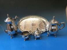 A five piece silver plated tea and coffee set on a tray