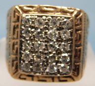 A 9ct gold gentleman's ring set with 20 diamonds (size U,