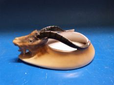 An unusual figural dish in the form of a goat