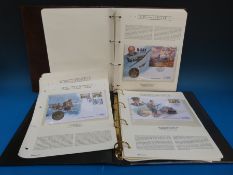 Two albums containing first day covers and coins 'History of WWII'