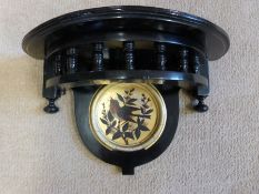An aesthetic movement wall bracket with decoration of a robin, width 39.