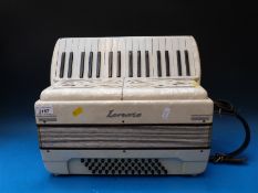 A 1960s Lorenzo 48 bass Italian piano accordion,