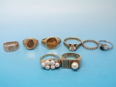 A 9ct gold ring set with pearls, 9ct gold signet ring, 9ct gold ring set with a diamond,