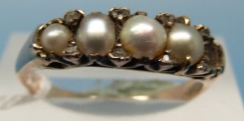 A yellow metal ring set with pearls and diamonds (size Q)