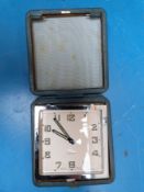 A 1920s square travelling timepiece with Swiss eight day movement,