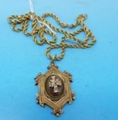 A yellow metal chain marked 9ct gold with a Victorian pendant set with five diamonds in a cross