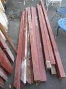 A quantity of wooden posts to form a pergola