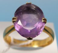A hallmarked 22ct gold ring set with a large amethyst (size R)