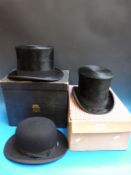 Two top hats,